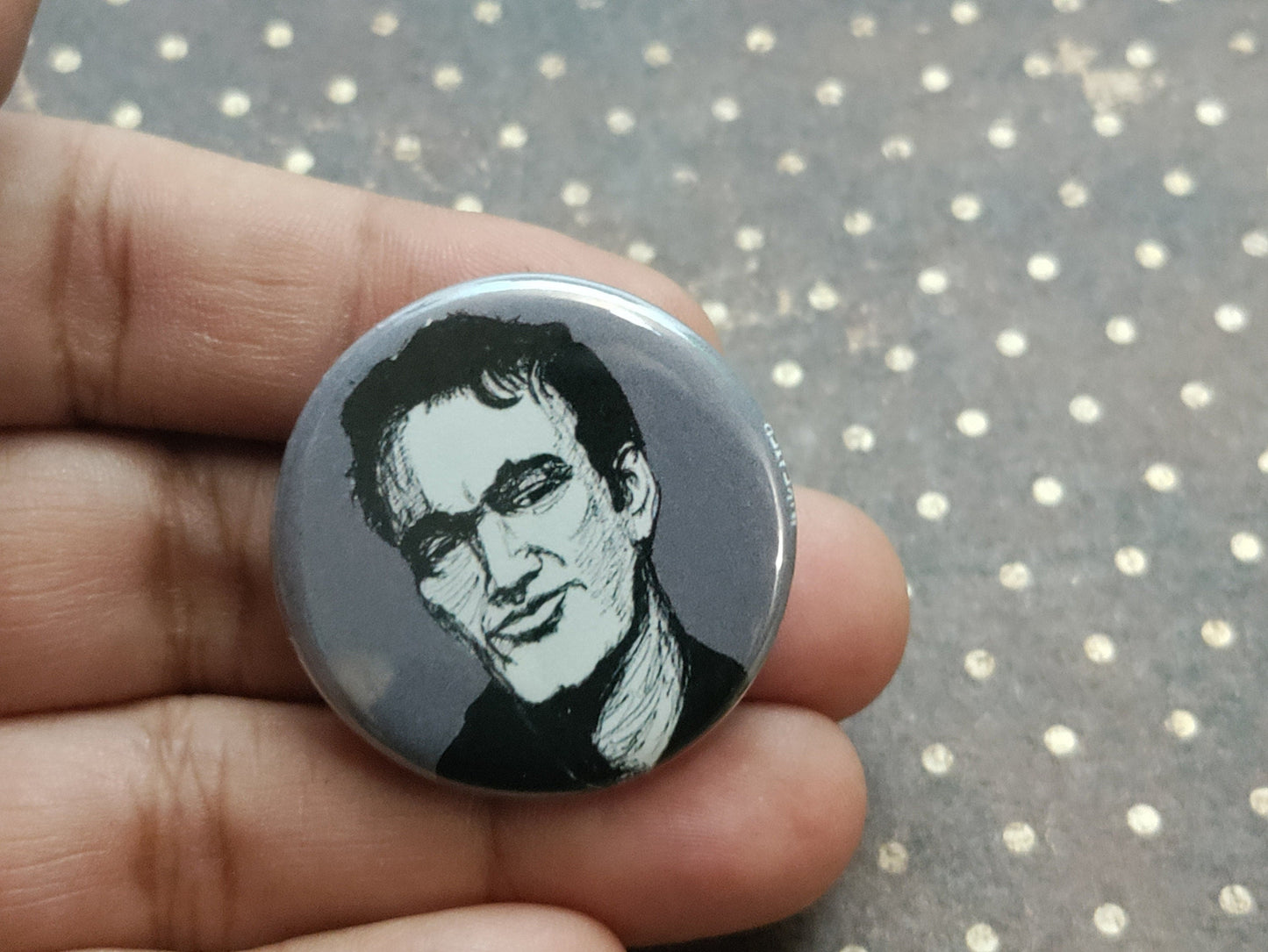 Embrace the Tarantino magic with our Quentin Tarantino pinback button.