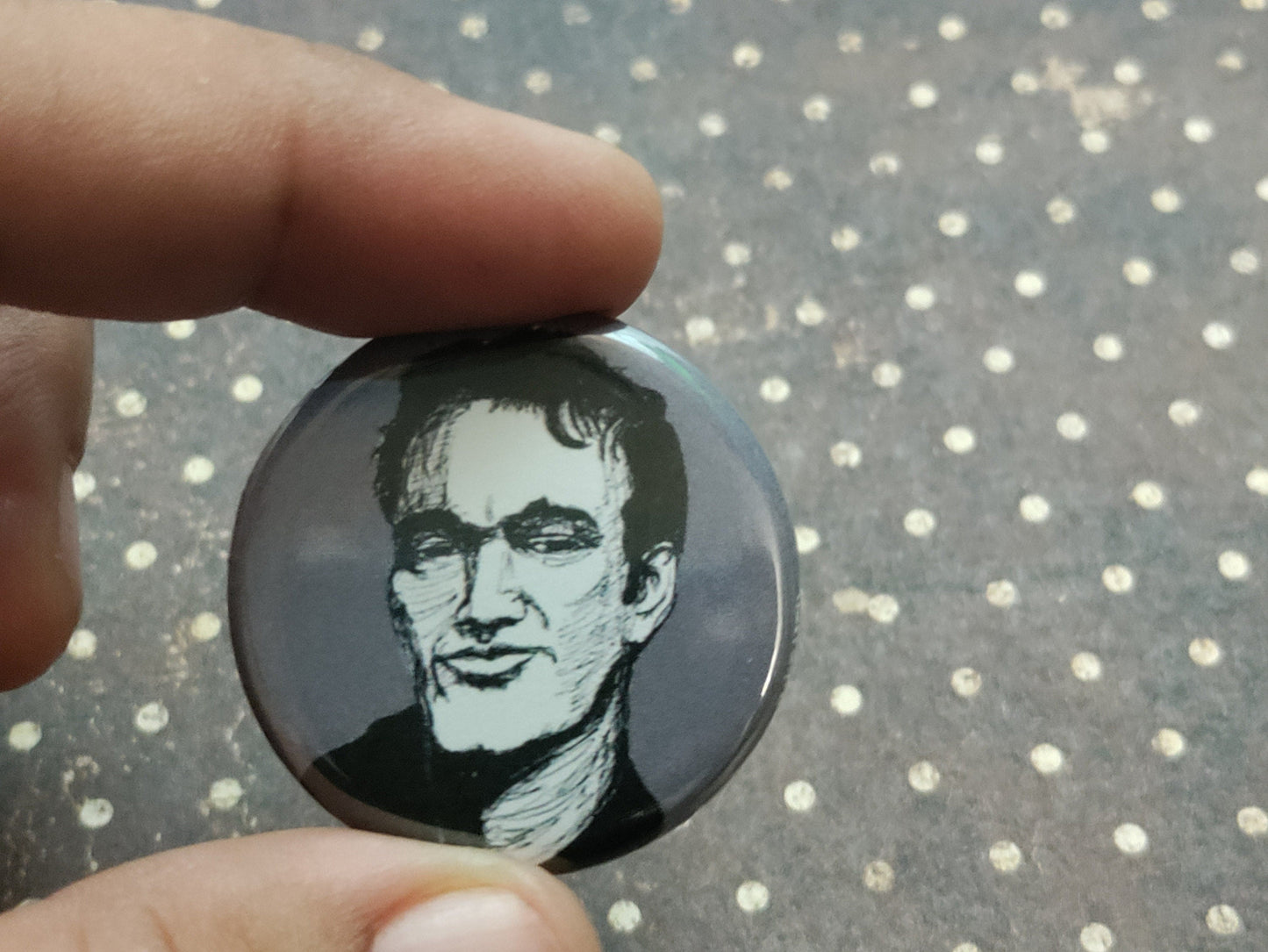 Embrace the Tarantino magic with our Quentin Tarantino pinback button.