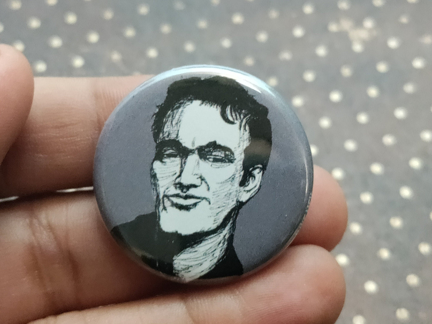 Embrace the Tarantino magic with our Quentin Tarantino pinback button.